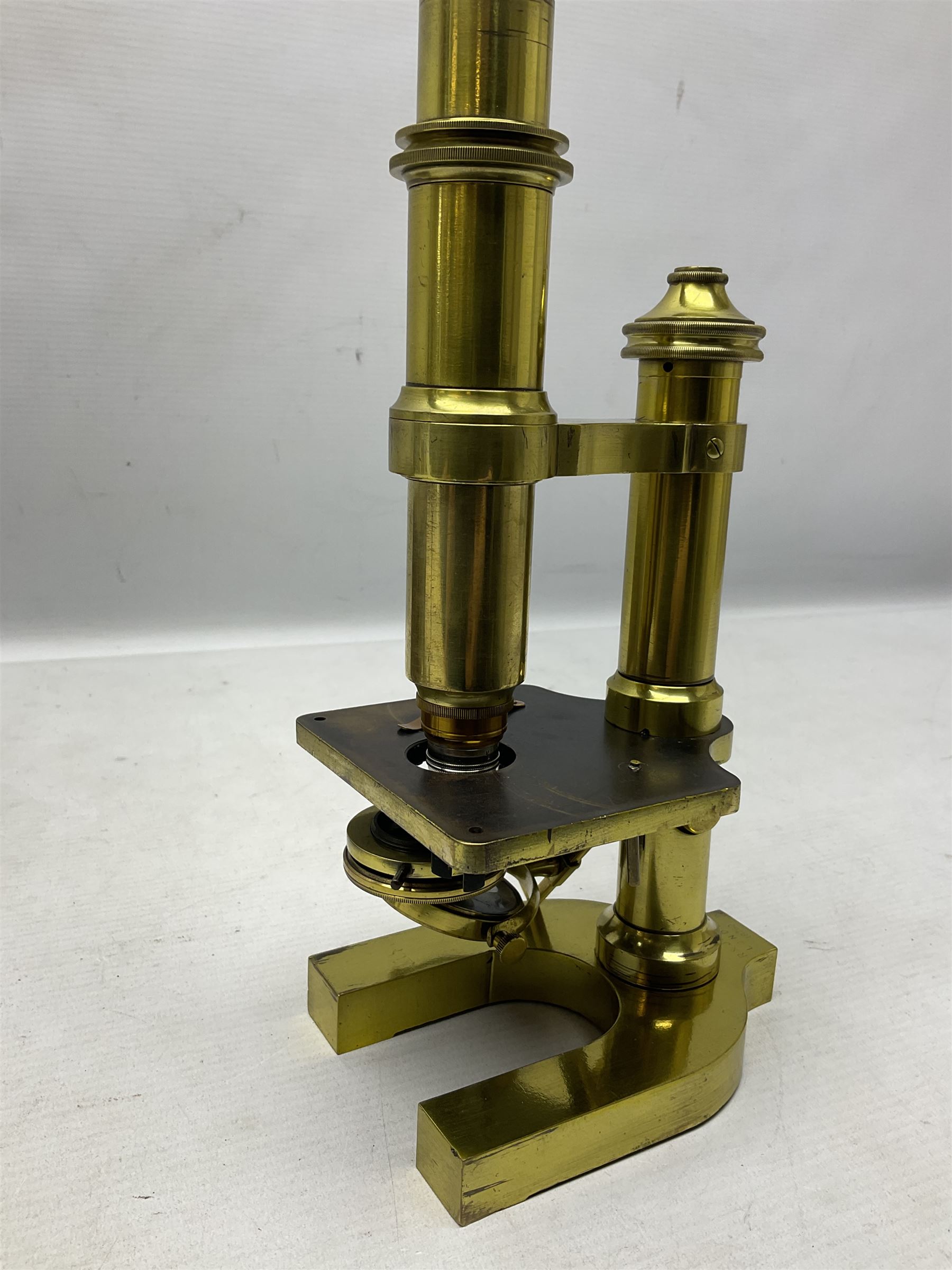 19th century brass monocular microscope by R. & J. Beck London No.18760 with hinged column and pitchfork base H25cm; in fitted mahogany case with two lenses