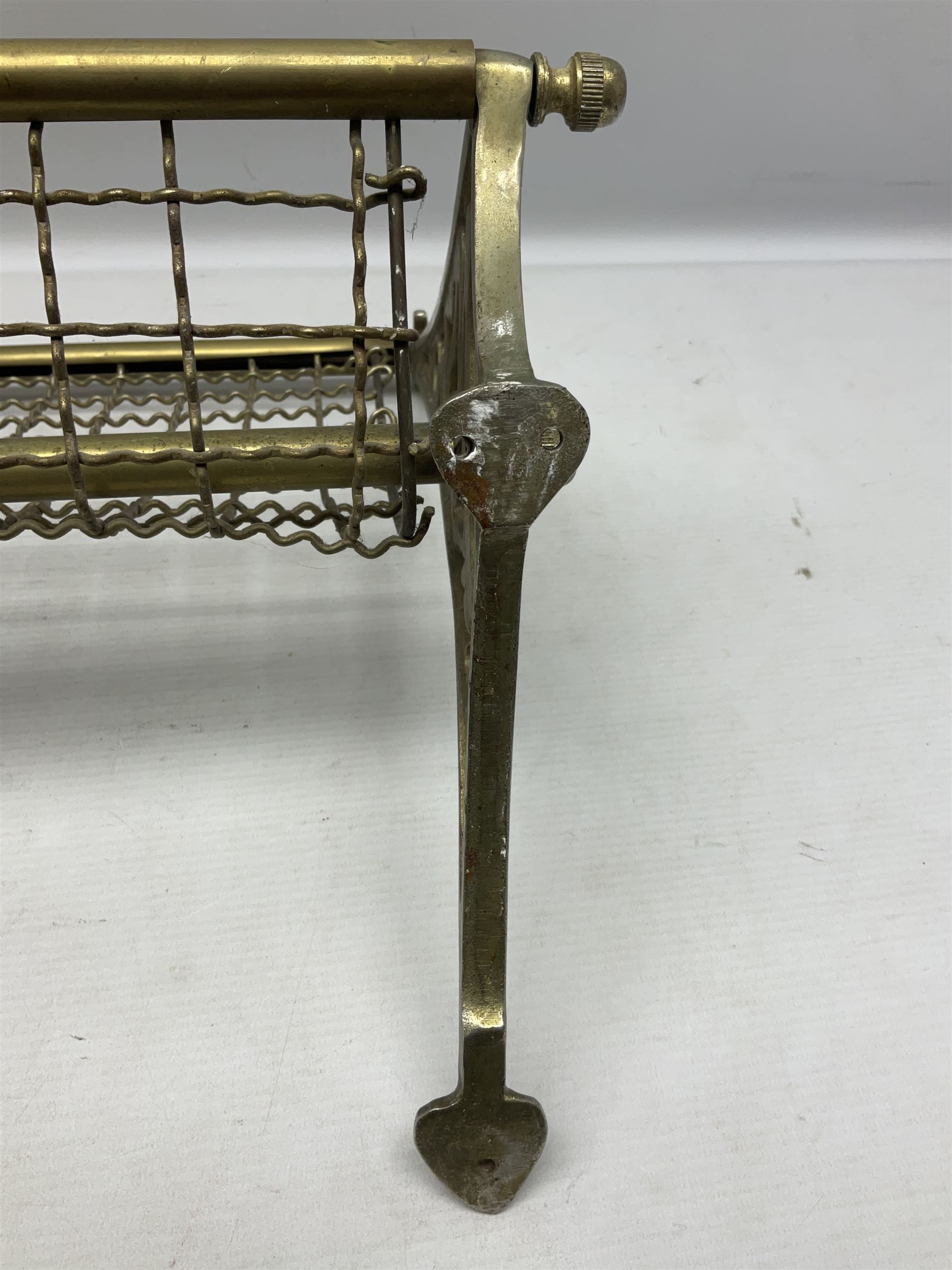 Railway interest - carriage compartment style wall mounting brass and mesh luggage rack, the ends cast with the initials NSWR (New South Wales Railroad) L77cm