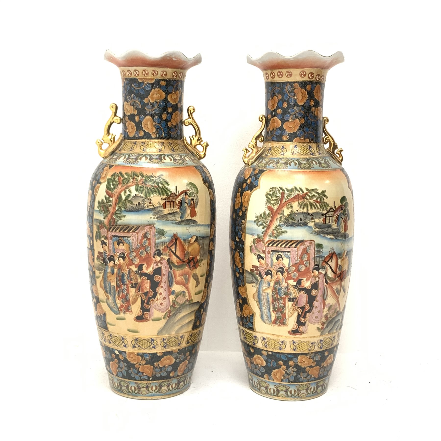 A pair of Chinese floor vases, of baluster form with frilled rim and twin gilt handles