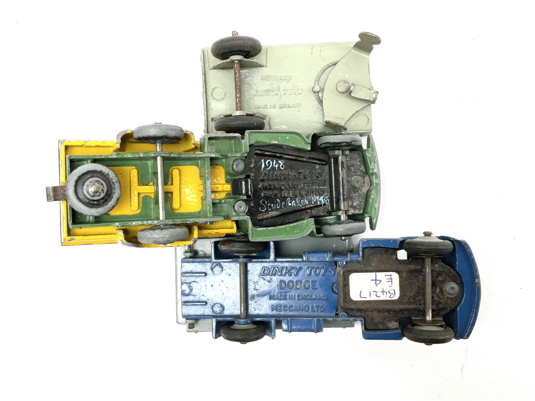 Dinky - six unboxed and playworn early die-cast commercial vehicles including French made Studebaker M16 covered wagon, Trojan Oxo van, B.E.V. Truck, Dodge Tipper, Royal Mail Van etc (6)