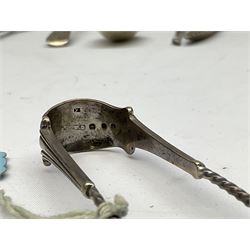 Small group of silver, to include Georgian Fiddle pattern teaspoon, later teaspoon, sugar tongs, etc., all hallmarked, approximate weighable silver 59 grams, approximate gross weight 113 grams