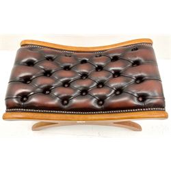 Beech ‘X’ framed footstool, upholstered in deep buttoned oxblood leather 