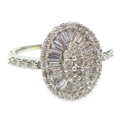  White gold diamond and baguette diamond mirror cluster ring, with diamond set shoulders, stamped 18K  