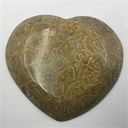 Two graduating fossilised coral dish in the form of hearts, largest D16cm