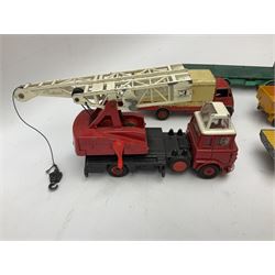 Dinky - eight unboxed and playworn/repainted commercial vehicles including Foden flatbed lorry, Bedford Articulated lorry, Leyland Comet Ferrocrete lorry, Guy Spratts panel van, Fire Engine, Jones Fleetmaster, Commer breakdown truck etc (8)