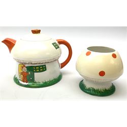 Shelley Boo Boo three piece tea set designed by Mabel Lucie Attwell, comprising teapot modelled as a house, sugar bowl modelled as a toadstool, and creamer modelled as an elf, each with printed marks beneath, together with a Shelley Mabel Lucie Attwell teacup and saucer. 