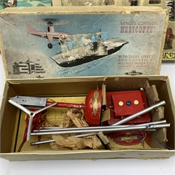 Britains Deetail Cowboys and Indians set No.7630, boxed; Britains part set of Royal Canadian Mounted Police No.7695, boxed; and Nulli Secundus Remote Control Helicopter, boxed (3)