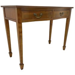 Georgian design yew wood serpentine side table, crossbanded top with reed moulded edge, fitted with two cock-beaded drawers, on square tapering supports with spade feet