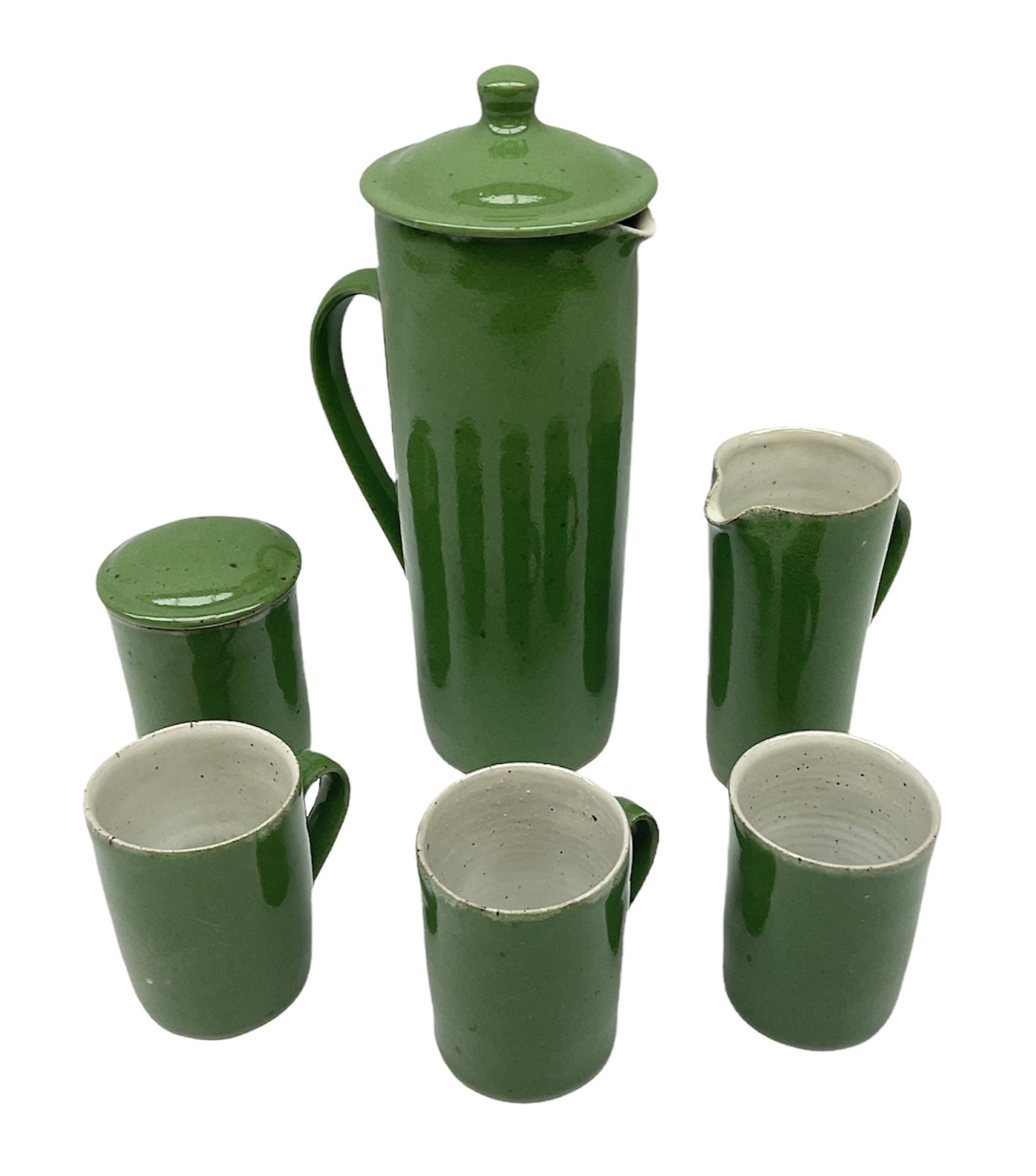 Rupert Spira (born 1960) stoneware coffee service decorated with vivid green glaze, comprising coffee pot, three cups, lidded sucrier and milk jug, all having impressed RS marks beneath, tallest H25cm