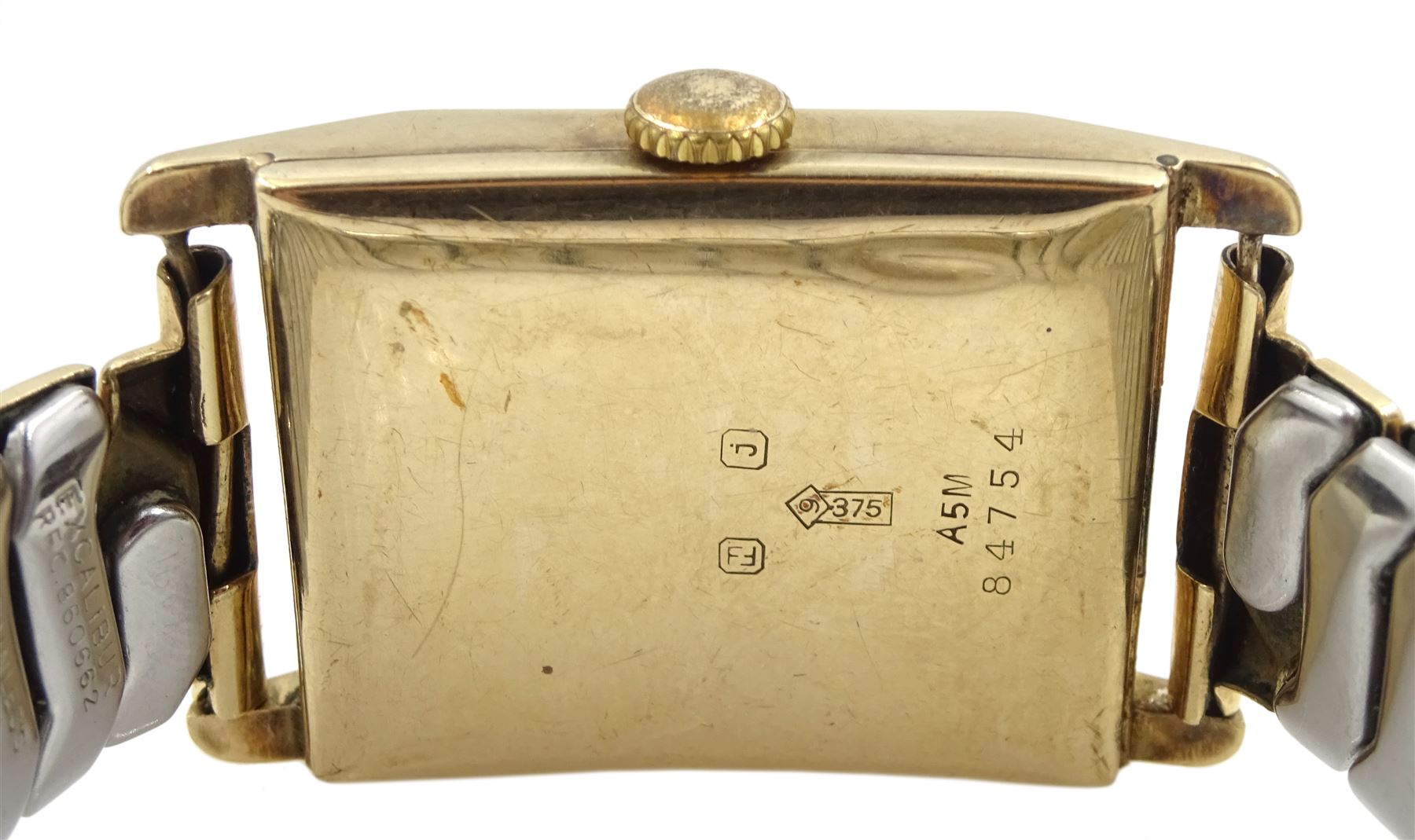 Swiss early 20th century 9ct gold manual wind Jump Hour wristwatch watch, Glasgow import marks 1932, on expanding gilt strap