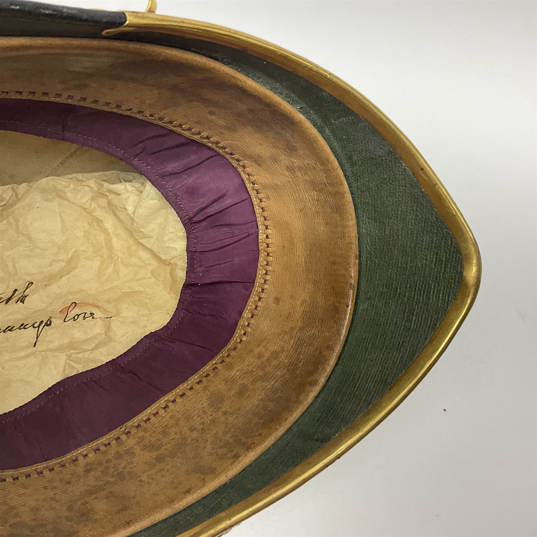 Late Victorian North Staffordshire Regiment Officer's Home Service Blue Cloth Helmet, having incorrect other ranks gilt metal Queen's crown helmet plate to the front with later leather backing, removable spike to the top on a shaped cruciform base with rosette fittings, rosette side bosses, brass trim to the front peak, and leather and velvet backed chin scales, with leather sweat band, the interior with makers stamp for Hawkes & Co 14 Piccadilly London