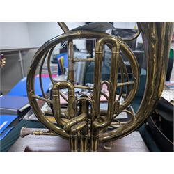 Boosey & Co Ltd French horn, converted into a table lamp, upon a wooden plinth, H45cm