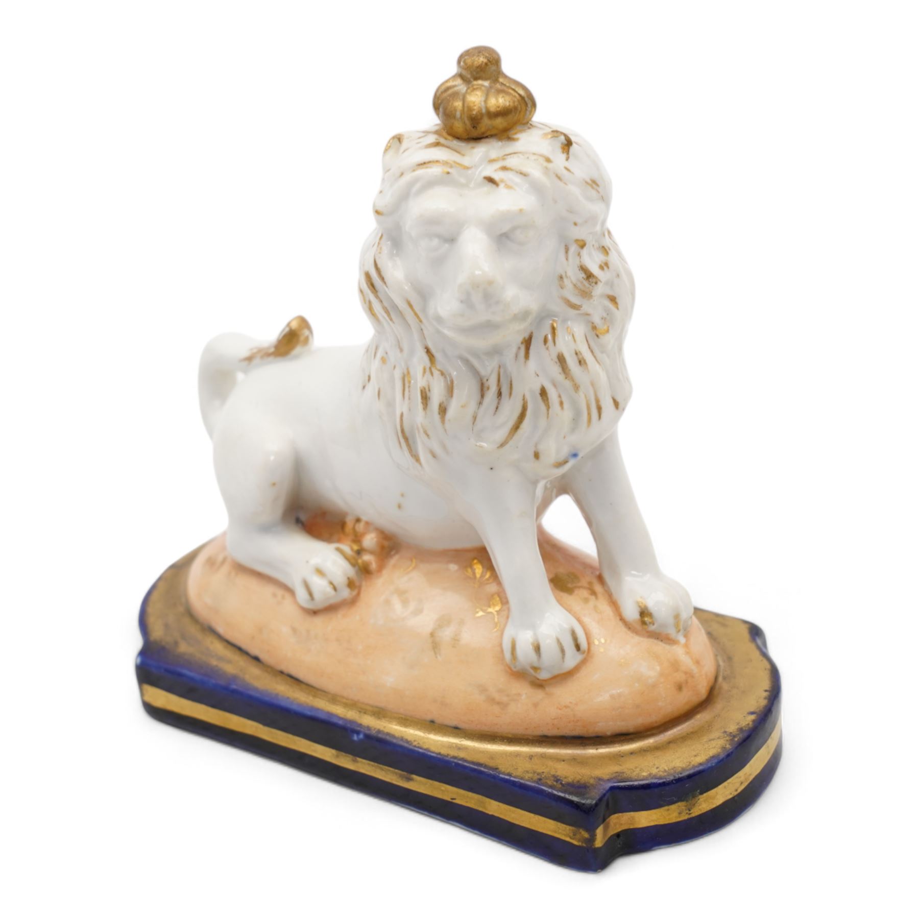 Early 19th century English porcelain miniature rosewater sprinkler in the form of a coffee pot, floral encrusted and painted body with flower knop handle and scroll handle, pattern no. 7916, H16.5cm, 19th century Rockingham style seated model of a Lion, L9.5cm and an early 19th century oval dish, inscribed beneath Geo. Maddey, 1803 (3)