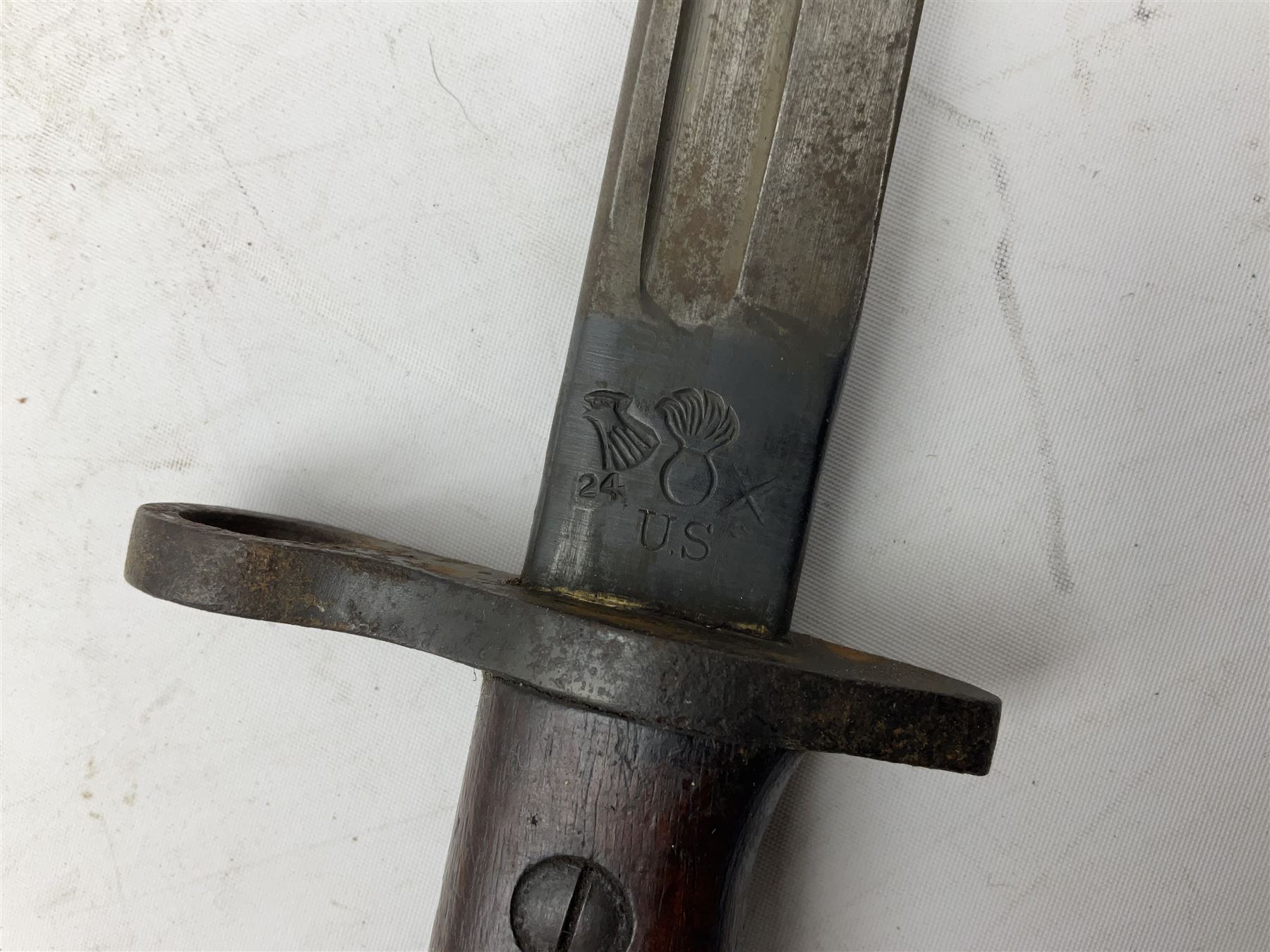 WW1 American Model 1917 Enfield bayonet by Remington with 43cm fullered steel blade; in leather scabbard with frog L59cm overall; and American M5A1 knife bayonet marked MILPAR COL to the cross-piece (no scabbard) (2)