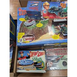 Gerry Anderson interest collectables and toys, including Carlton Thunderbirds Tracy Island, Matchbox Stingray Marineville Headquarters, both boxed, Matchbox carded Thunderbirds and Stingray figures and vehicles, Captain Scarlet and Joe90 collectables, etc