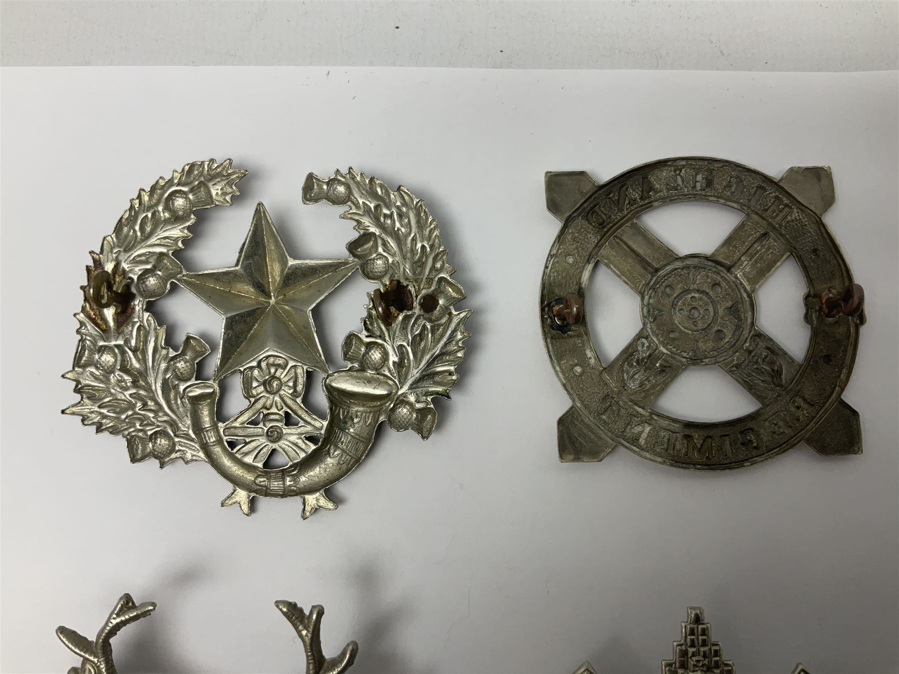 Thirteen Scottish metal Glengarry badges including Black Watch, Highland Regiment, Cameronians, Argyll & Sutherland, Seaforth Highlanders, Kings Scottish Own Borderers etc