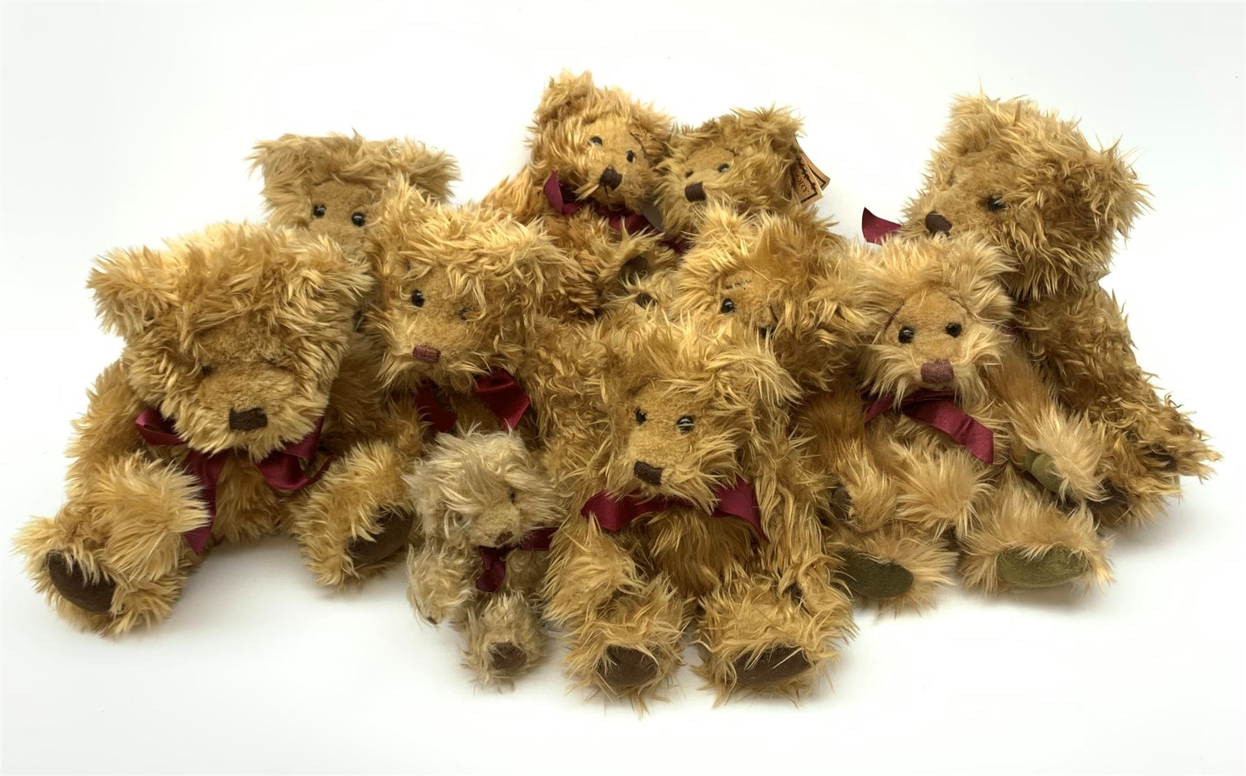 Ten Russ Gregory teddy bears designed by Carol-Lynn Rossel Waugh including one Baby Gregory, largest H8