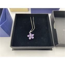 Silver stone set jewellery including amethyst flower necklace and cubic zirconia stud earrings, together with two Swarovski crystal rings and a Swarovski infinity symbol pendant necklace, mostly boxed 