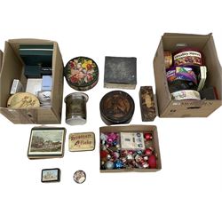 Collection of vintage tins, including quality street, together with a large collection of placemats and vintage christmas decorations, two boxes.