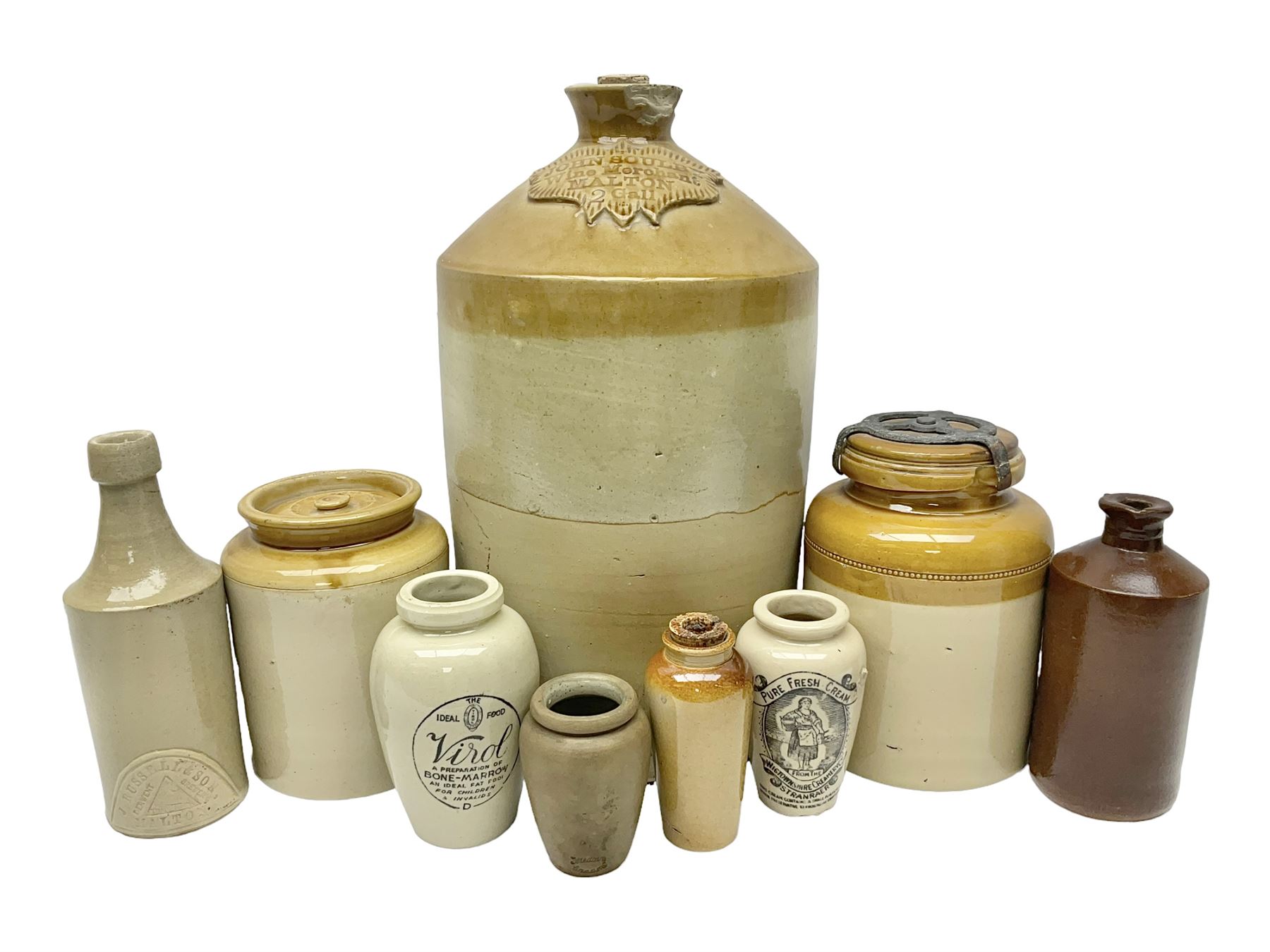 Large 2 gallon stoneware flagon, stamped 'John Soulby Wine Merchant Malton 2 Gall', together with a collection of similar stoneware jars and bottles, largest H40.5cm