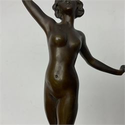 Bronze figure modelled as a nude woman with one arm raised a crescent moon upon her forehead, raised upon a circular stepped plinth, H36cm