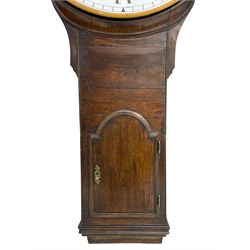 English George III oak 8-day Tavern clock circa 1790, with a re-painted 24” circular dial with Roman numerals, minute track and matching brass hands, trunk with shaped earpieces and small break arch topped door with applied moulding, chisel shaped base with ogee moulding and pendulum adjustment doors to the sides, weight driven five-pillar timepiece movement with an anchor escapement, dial unsigned.
With pendulum and weight. 
