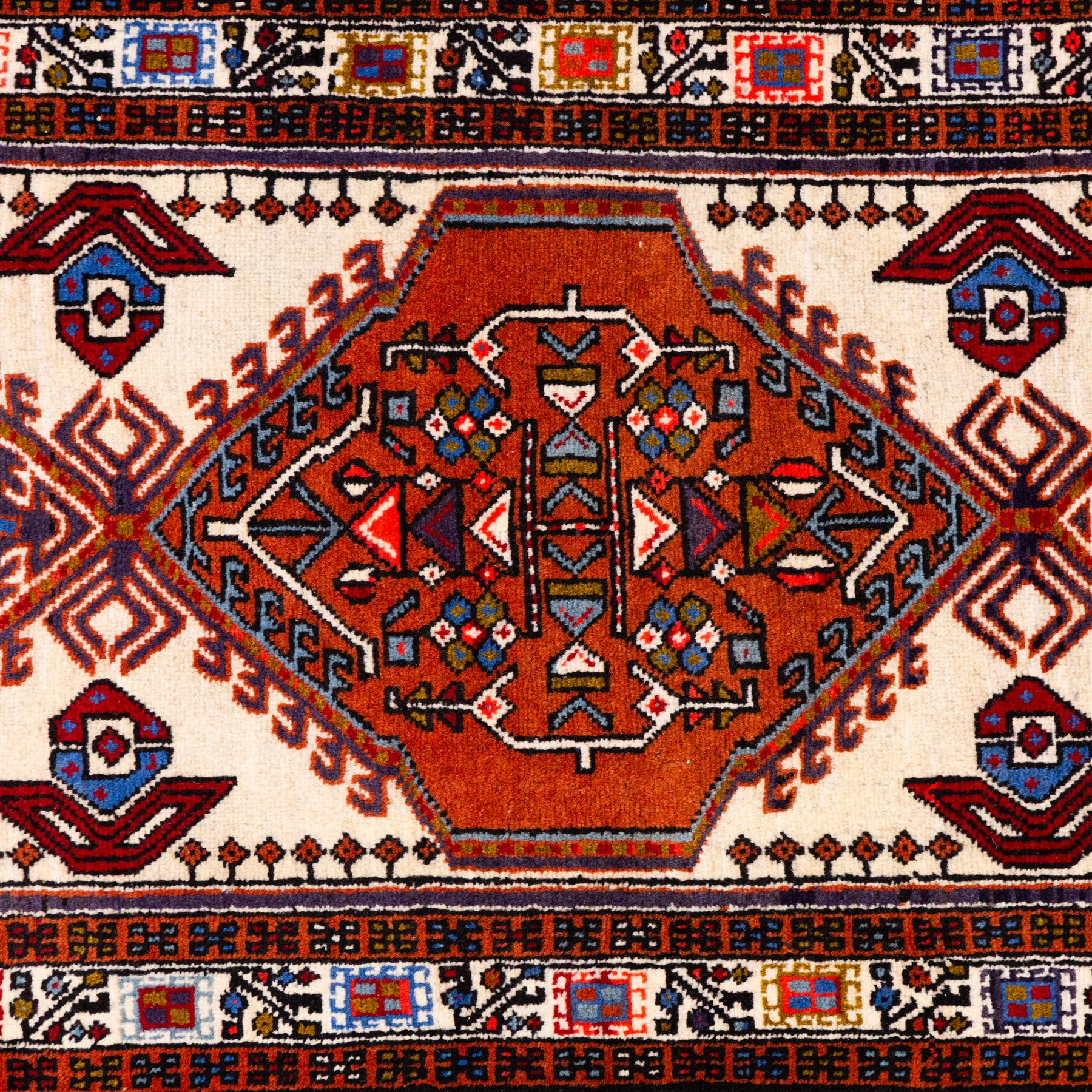 North West Persian Ardebil hand-knotted runner, ivory field decorated with row of large hexagonal medallions enclosing stylized geometric and floral motifs, linked by angular devices, within multiple geometric borders, cotton fringe ends 