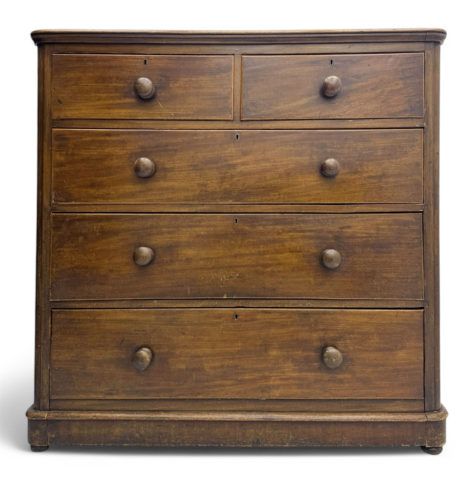 19th century mahogany chest of drawers, rectangular top over two short and three long graduated cockbeaded drawers, raised on compressed bun feet
