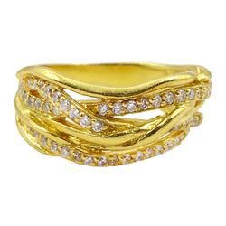 Silver-gilt cubic zirconia crossover ring, stamped 925 