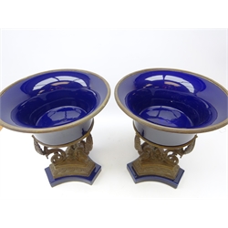  Pair large Empire style bronze and cobalt blue glazed centre-pieces with trumpet shaped bowl, acanthus leaf scroll supports and pineapple finials on stepped tri-form base, H42cm x D36cm   