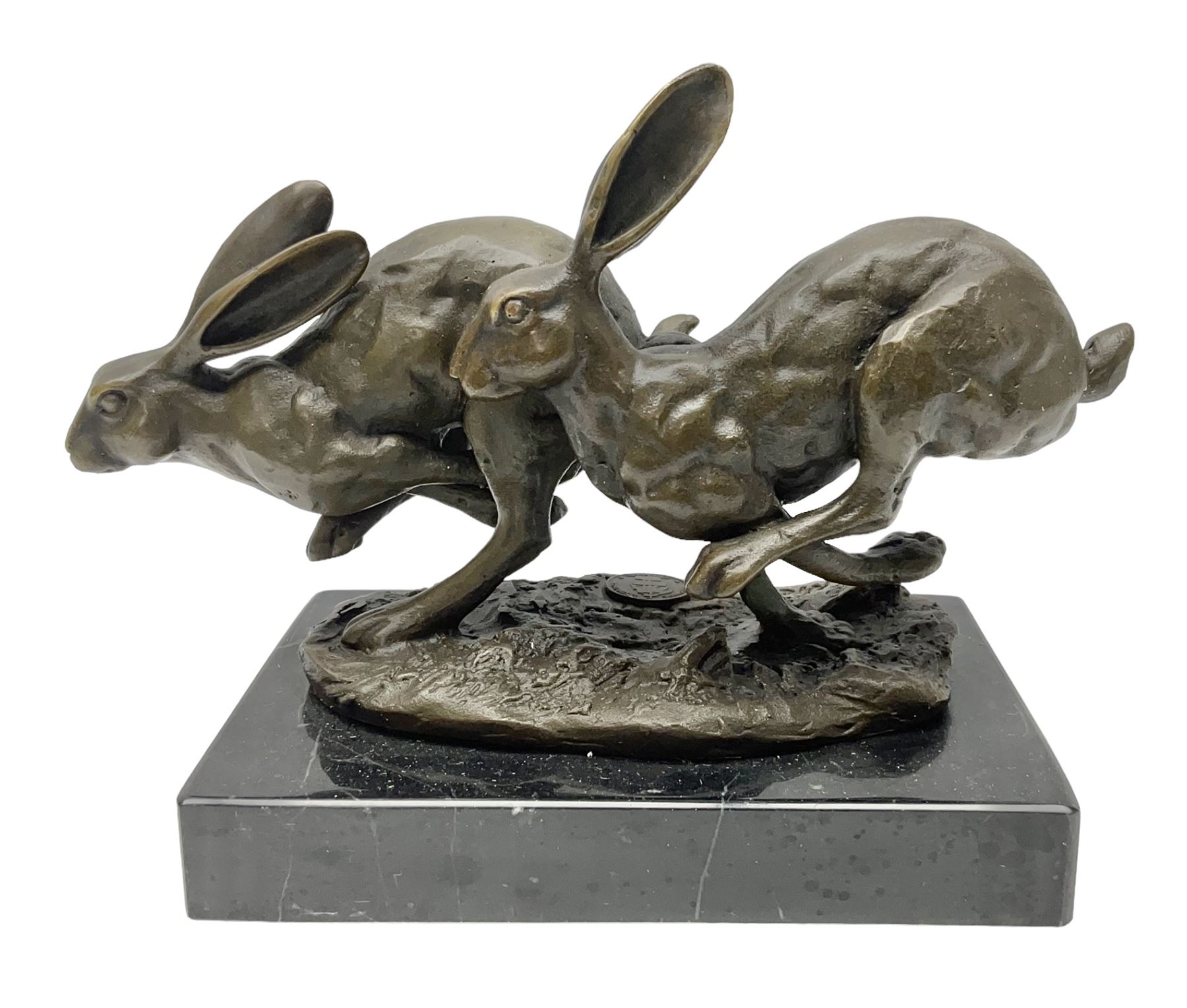 Bronze figure group, modelled as two hares in chase, upon a naturalistic base signed Nick and with foundry mark, raised upon a rectangular marble base, overall H12cm. 