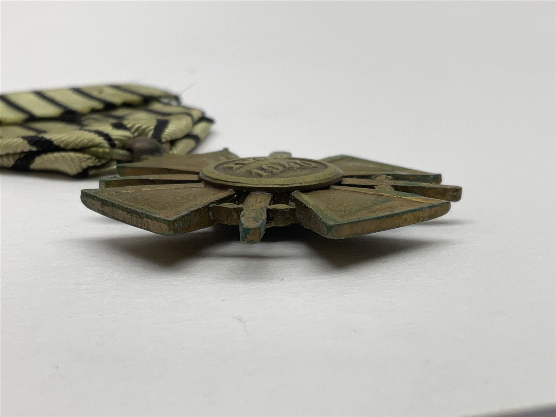 Four French medals - St. Helena medal with bust of Napoleon to obverse and inscription to reverse 'Campagnes de 1792 a 1815. A ses compagnons de gloire sa derniere pensée Ste. Hélène 5 Mai 1821', established by Emperor Napoleon III in 1857; two WW2 Croix-de-Guerre; and WW2 Croix-du-Combattant; all with ribbons (4)