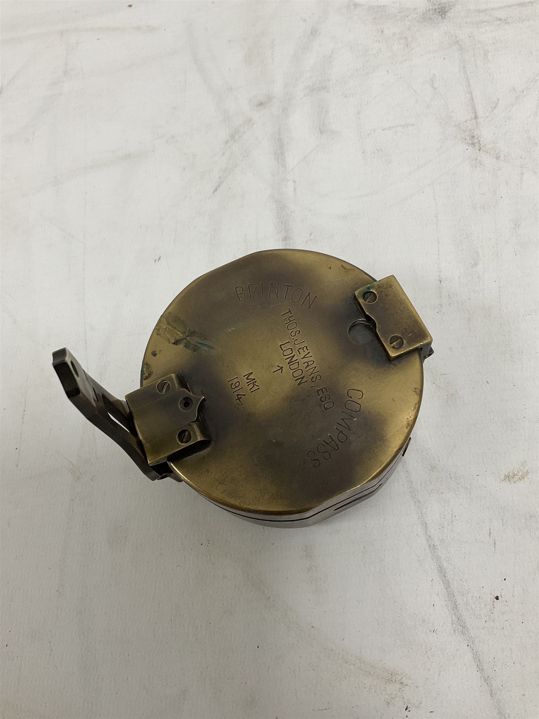 Brass military compass marked Brinton Compass, Thos Evans and Son London, L9cm