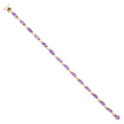 9ct gold amethyst and diamond bracelet, fifteen oval cut amethysts each spaced by two diam...