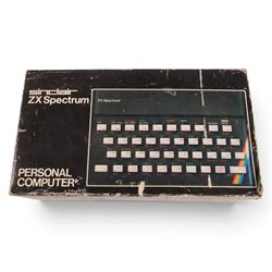 Vintage game consoles, comprising Sinclair ZX Spectrum, Zeon T-800 TV Game and Radofin Programmable Tele-Sports IV, all boxed, with six Spectrum games comprising Road Runner, Jack The Nipper, Batman, The Great Escape, Movie and Masters of the Universe