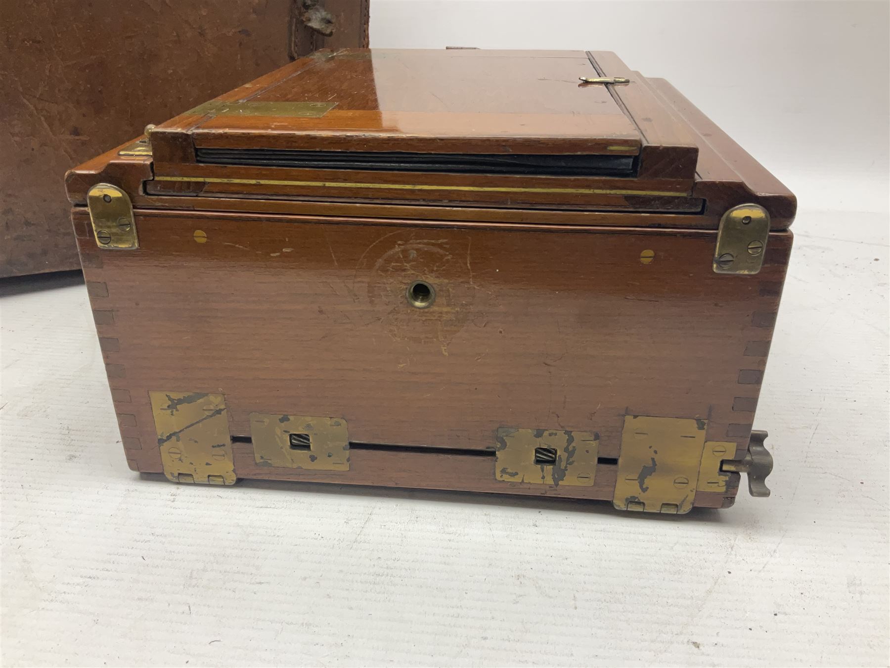 Sanderson Koilos folding plate camera in mahogany and lacquered brass, with 'Ensign Anastigmat Series IV No 2' lens, serial no 173998, with original leather case
