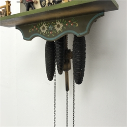 Two Black Forest style wall hanging cuckoo clocks