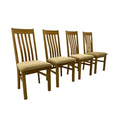 Light oak rectangular dining table, and four chairs