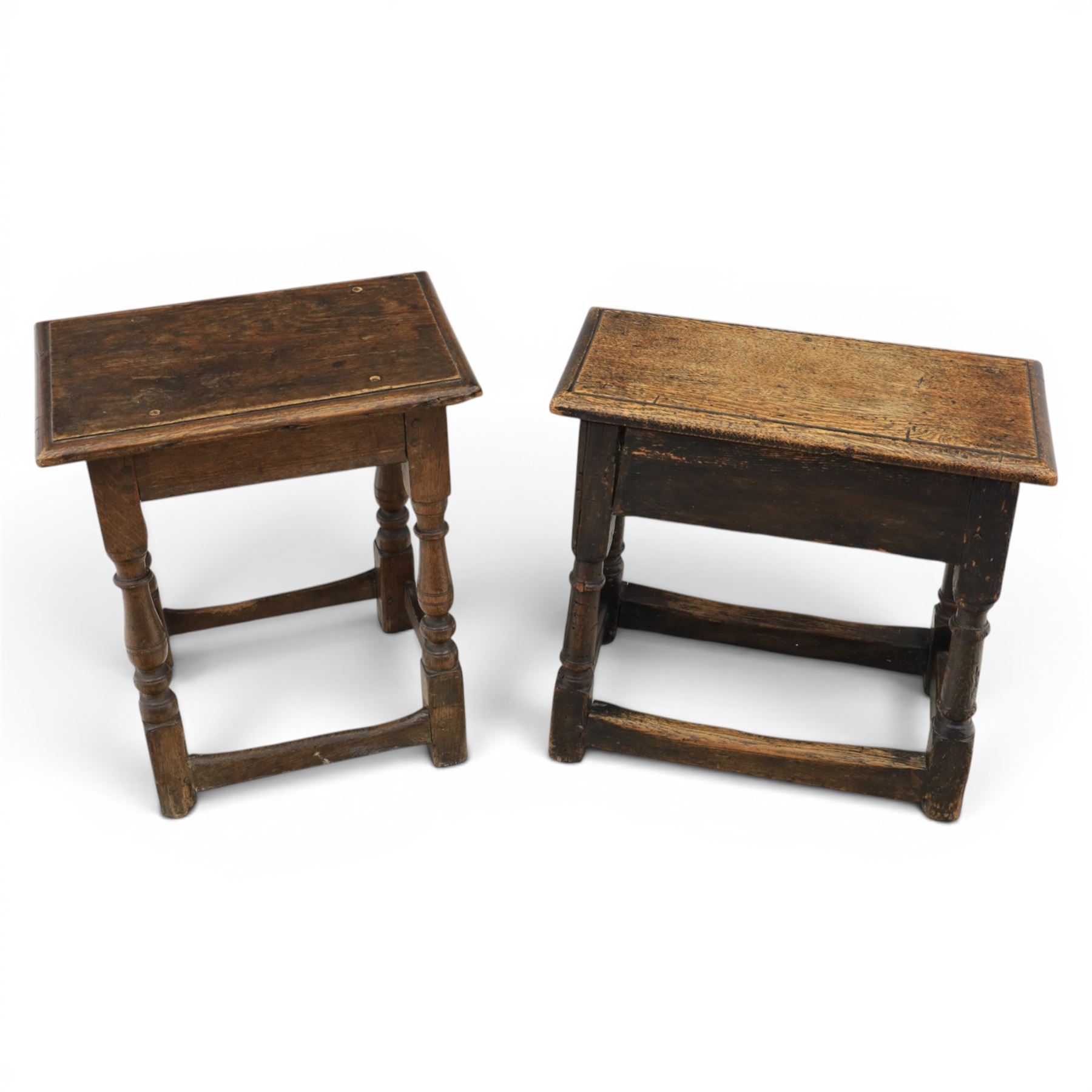 Two 19th century oak joint stools raised on turned supports united by stretchers