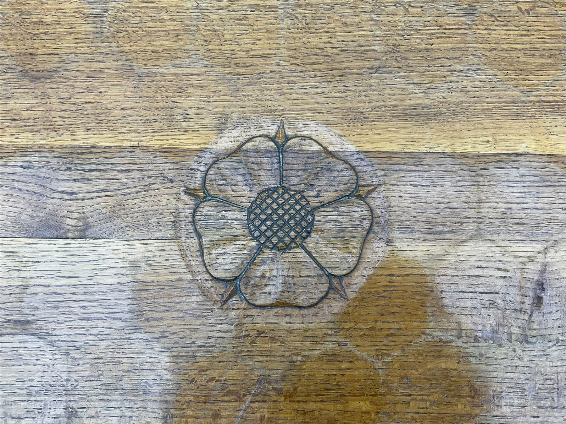 'Woodpeckerman' - Yorkshire oak rectangular coffee table by Stan Dodds, carved central rose, stretcher base, carved Woodpecker motif to the leg 
