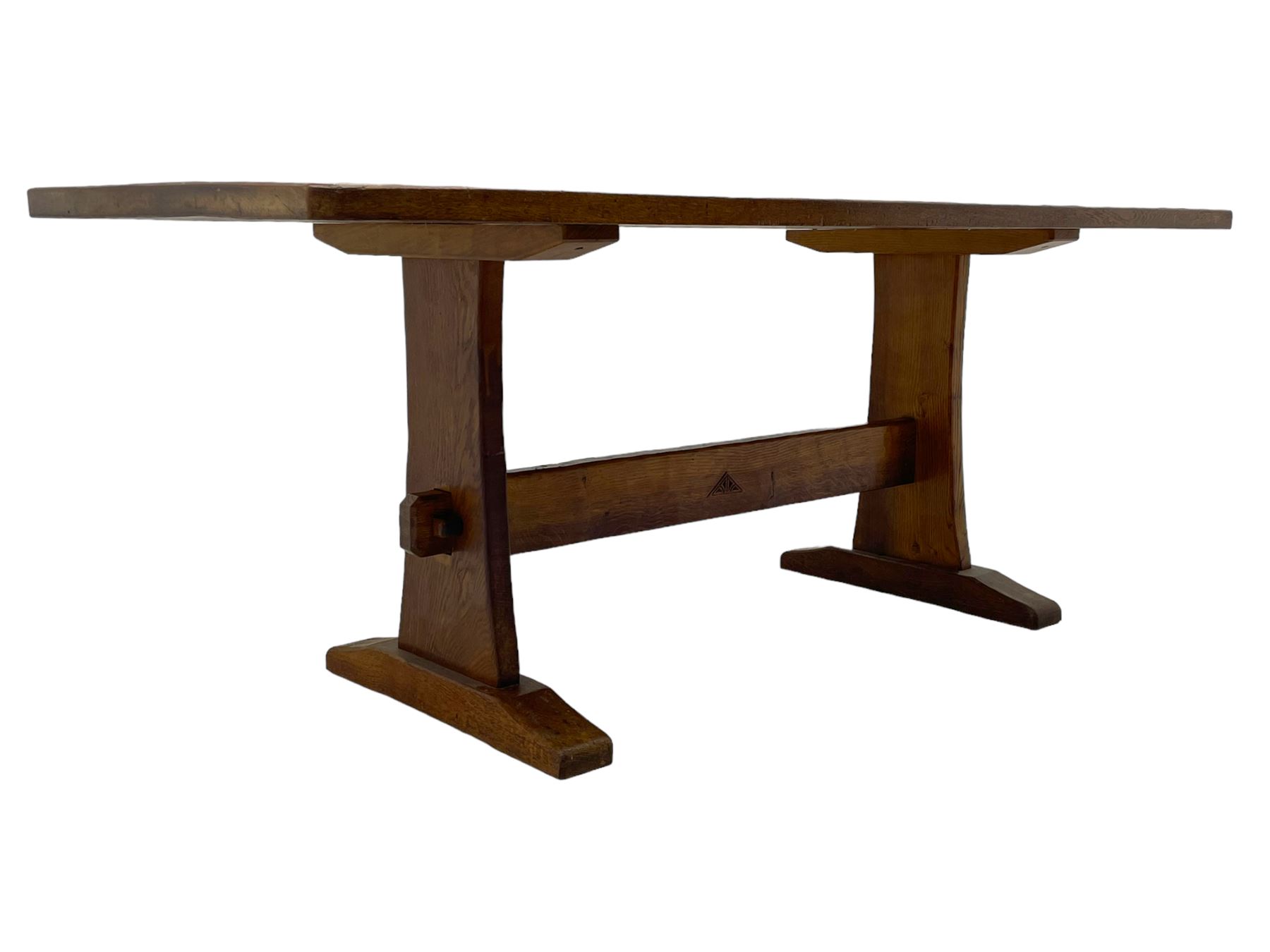 Yorkshire Oak 'Kingpost' - oak dining table, rectangular adzed top on tapered end supports, united by pegged stretchers carved with kingpost signature, on sledge feet, by Robert Ingham, Burton Leonard, Harrogate 