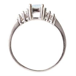 10ct white gold aquamarine and diamond ring, single octagonal cut aquamarine of approx 0.45 carat, with three tapered baguette cut diamonds set either side, stamped