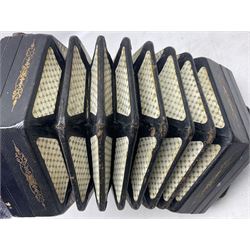 19th century Lachenal concertina of hexagonal form with fretworked nickel ends and thirty-four plus one bone buttons; straps marked Lachenal & Co Makers London and wooden handle stamped English Make Trade Mark L16cm