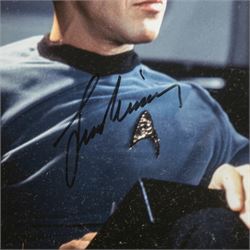 Limited edition Star Wars print 'The Voyage Begins' by Stewart Robinson numbered 516/1701, framed above three signed photographs of William Shatner as Captain James T. Kirk, Leonard Nimoy as Mr Spock and The Star Trek Legendary Four, all with certificates of authenticity verso, frame H109cm, W90cm