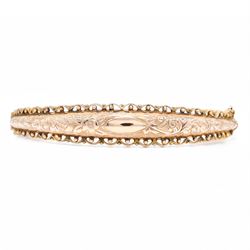 Edwardian 9ct rose gold bangle, with engraved decoration and wirework and bead work surrou...