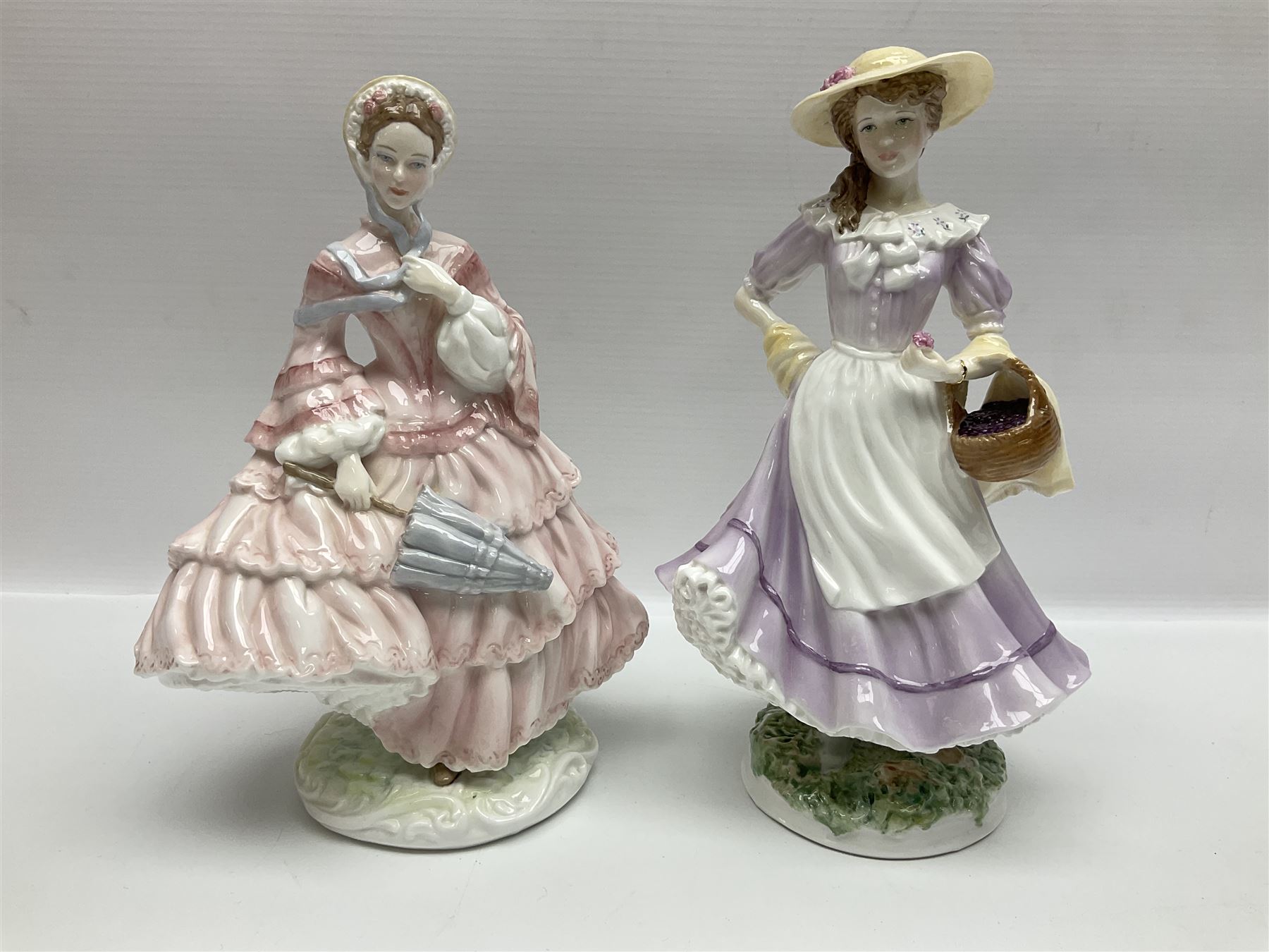 Three Coalport figures, comprising Eugenie, Lillie Langtry and Laura, together with seven other similar figures