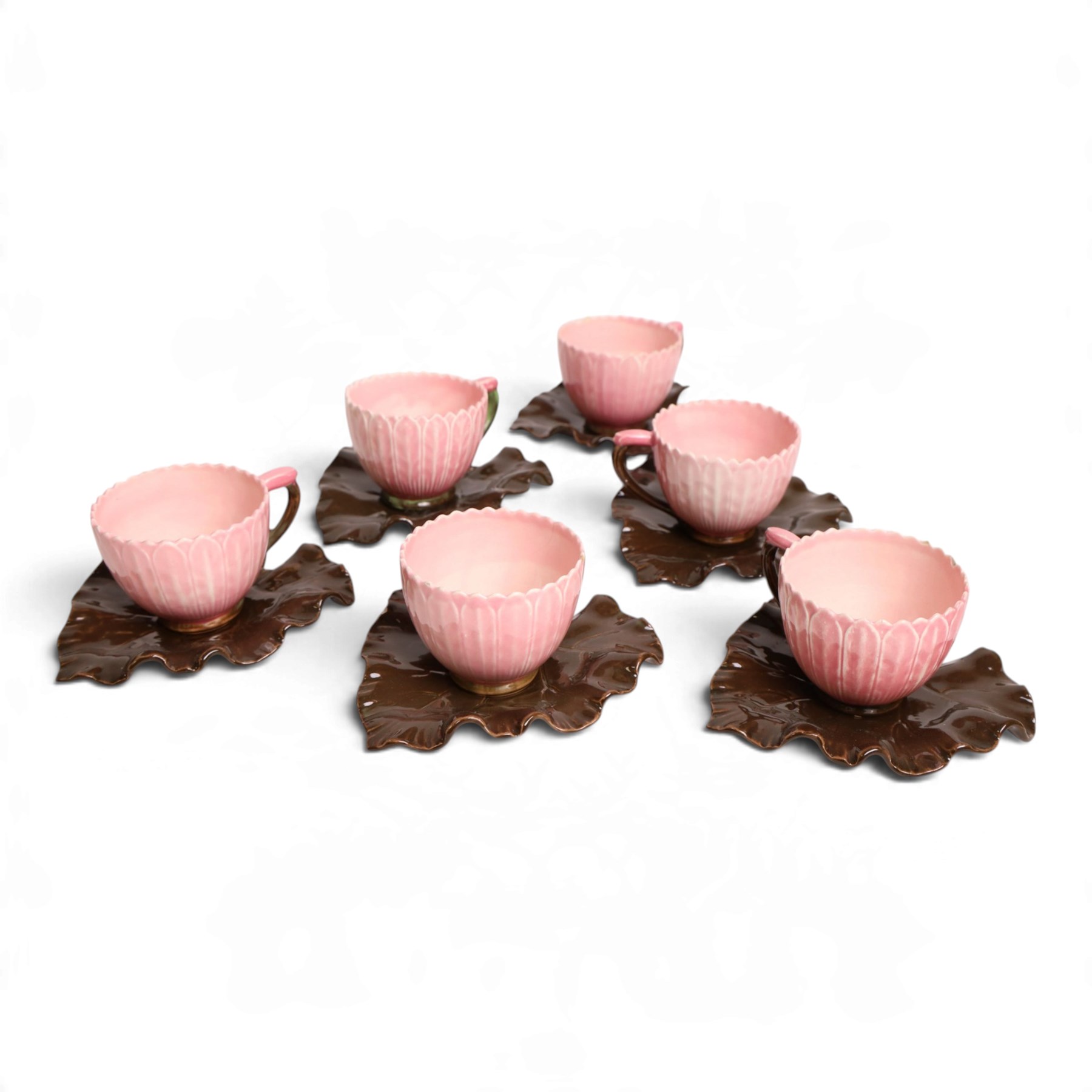 Set of six Zsolnay Pecs lotus moulded teacups and saucers, with impressed mark beneath, teacup D7cm