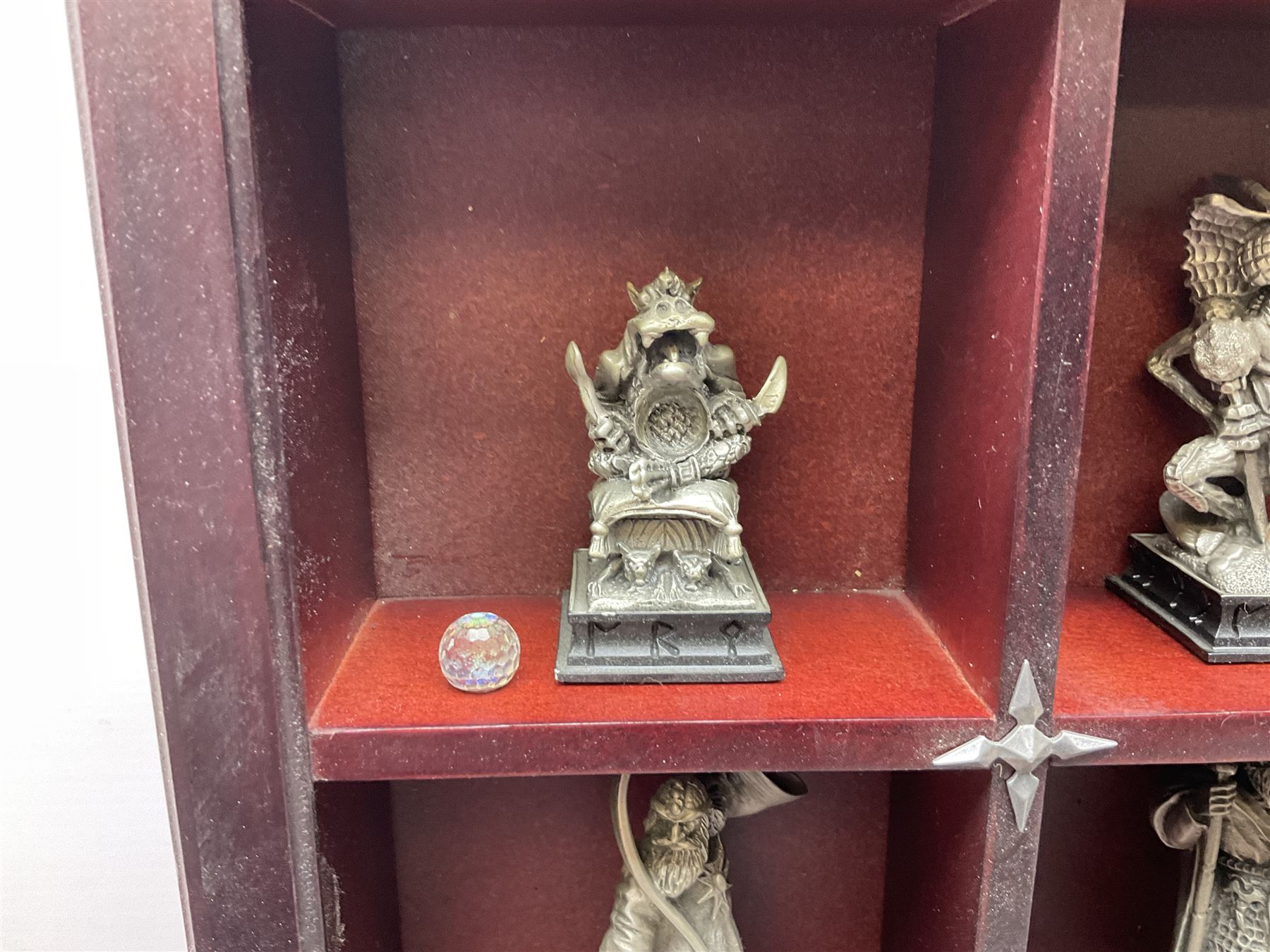 Danbury Mint 'The Fantasy of the Crystal' chess set consisting of mythical pewter chess pieces within a wooden case with chess board lid, together with 16 additional chess pieces in a wooden display case.