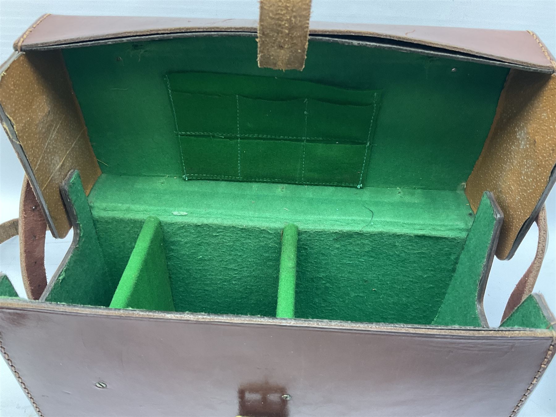 Post-WW2 stitched leather carrying case for an Exploder Dynamo-Condenser Mk.1 with baize lined fitted interior and carrying strap dated 1956 L28cm