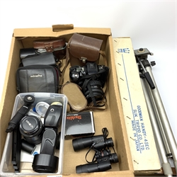 A selection of cameras and accessories, to include Kodak Retina, G B Bell & Howell 8mm, Kodak Instamatic 233-X, Minolta Dynax 700si, Kenko lens, Minolta flash, Minolta lens, Minolta 110 Zoom SLR, three assorted sized tripods, etc. 